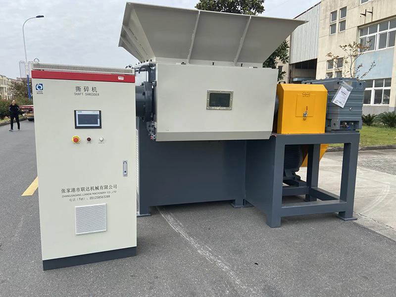 Waste fiber shredder